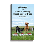 Cover of Honey's Natural Feeding Handbook for Dogs by Jonathan Self showing three dogs running in grassy field with Honey's branded food bowls