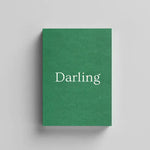 Green book cover with the title 'Darling' in white text on a gray background