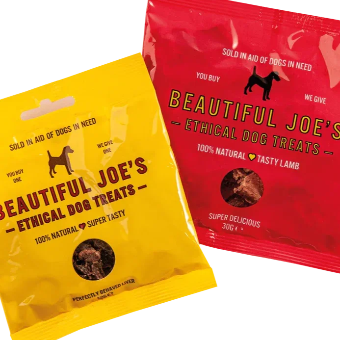 Beautiful Joe's ethical dog treats packets in yellow and red with natural lamb and liver flavors